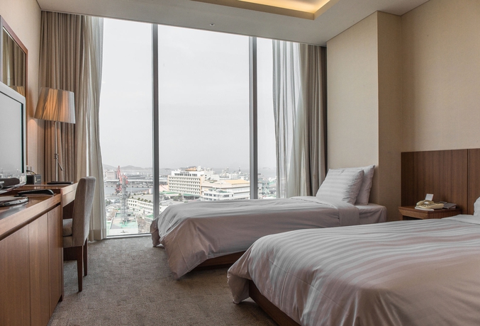 Imagen de la habitación del Hotel Harbor Park Hotel. Foto 7