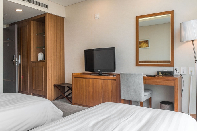 Imagen de la habitación del Hotel Harbor Park Hotel. Foto 8