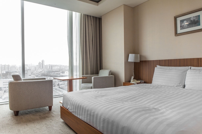 Imagen de la habitación del Hotel Harbor Park Hotel. Foto 12