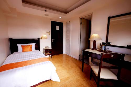Imagen de la habitación del Hotel Harbor Town. Foto 2