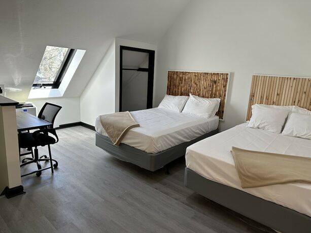 Imagen de la habitación del Hotel Harborside Suites. Foto 17
