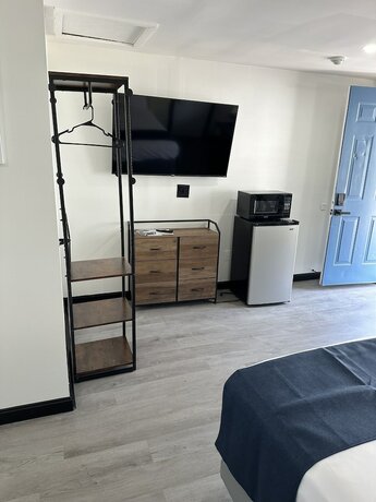 Imagen de la habitación del Hotel Harborside Suites. Foto 18