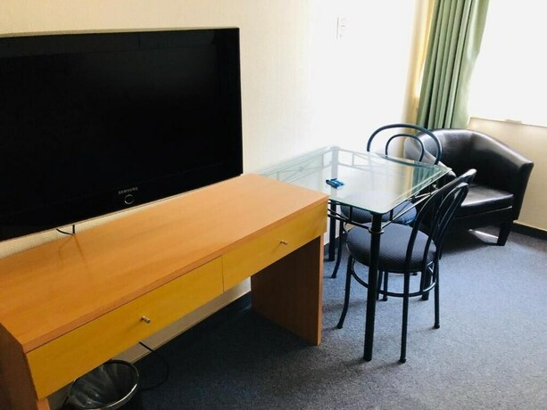 Imagen de la habitación del Hotel Harbour City Motor Inn, Wellington. Foto 14