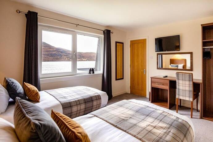 Imagen de la habitación del Hotel Harbour House Bed and Breakfast. Foto 17