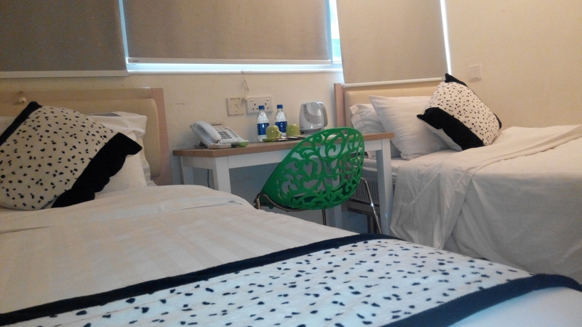 Imagen de la habitación del Hotel Harbour Inn, Kowloon. Foto 3
