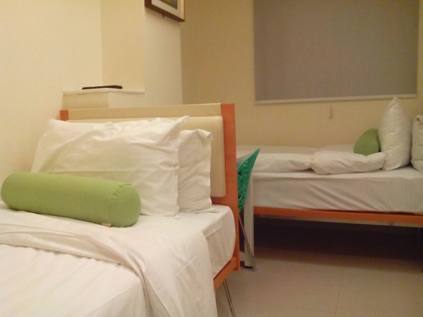 Imagen de la habitación del Hotel Harbour Inn, Kowloon. Foto 7