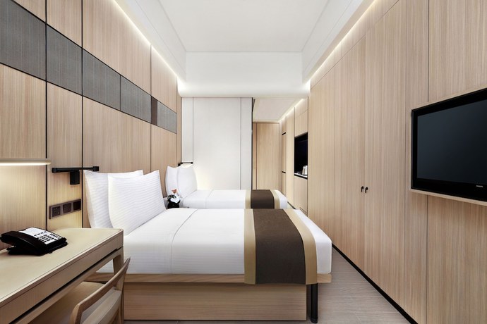 Imagen de la habitación del Hotel Harbour Plaza Metropolitan Shanghai. Foto 2
