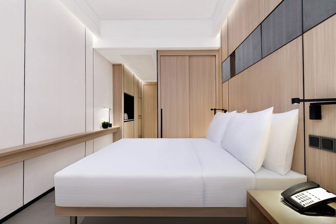 Imagen de la habitación del Hotel Harbour Plaza Metropolitan Shanghai. Foto 4