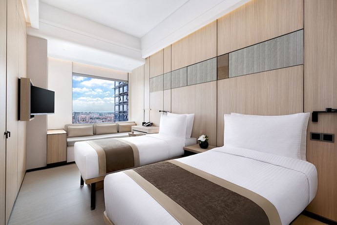 Imagen de la habitación del Hotel Harbour Plaza Metropolitan Shanghai. Foto 6