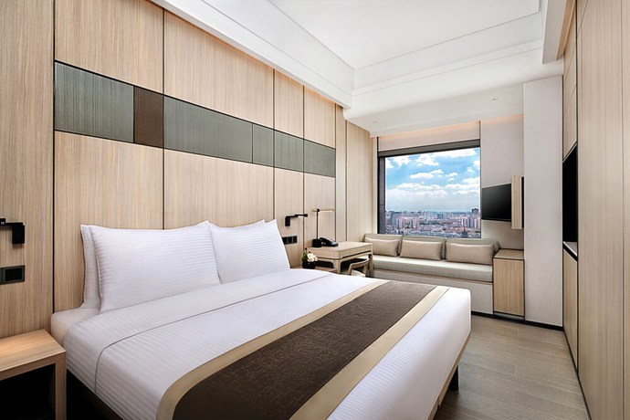 Imagen de la habitación del Hotel Harbour Plaza Metropolitan Shanghai. Foto 7