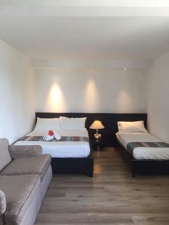 Imagen de la habitación del Hotel Harbour Side Lodge. Foto 13