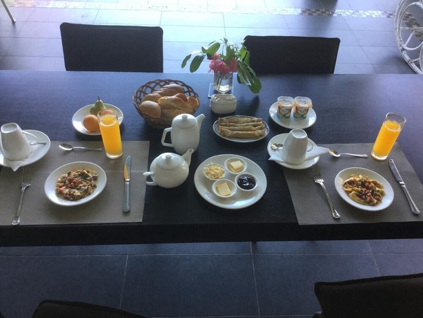 Imagen del bar/restaurante del Hotel Harbour Side Lodge. Foto 6