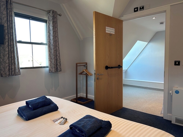 Imagen de la habitación del Hotel Harbour Stays - Ocean Square. Foto 13