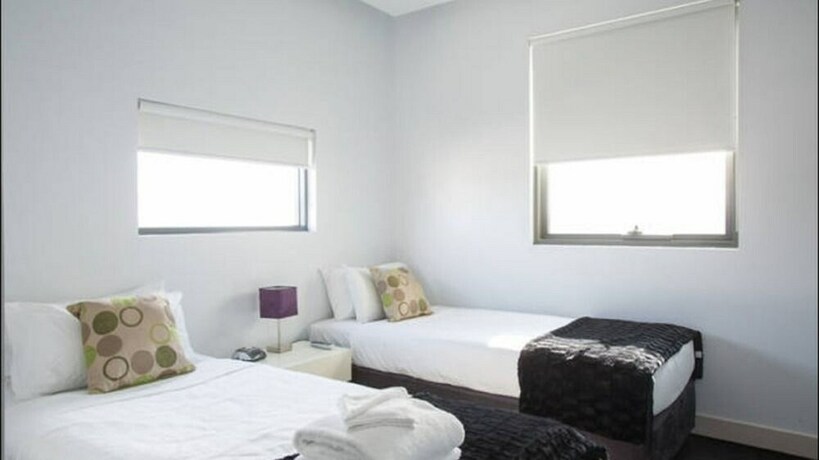 Imagen de la habitación del Hotel Harbour Town Apartment. Foto 33