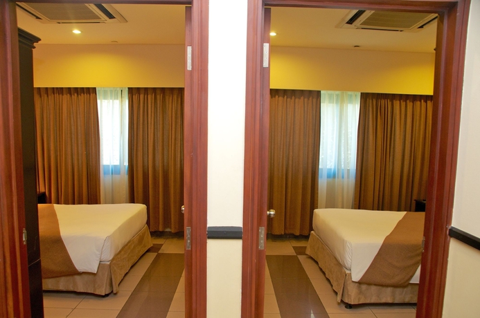 Imagen de la habitación del Hotel Harbour View Suites. Foto 6