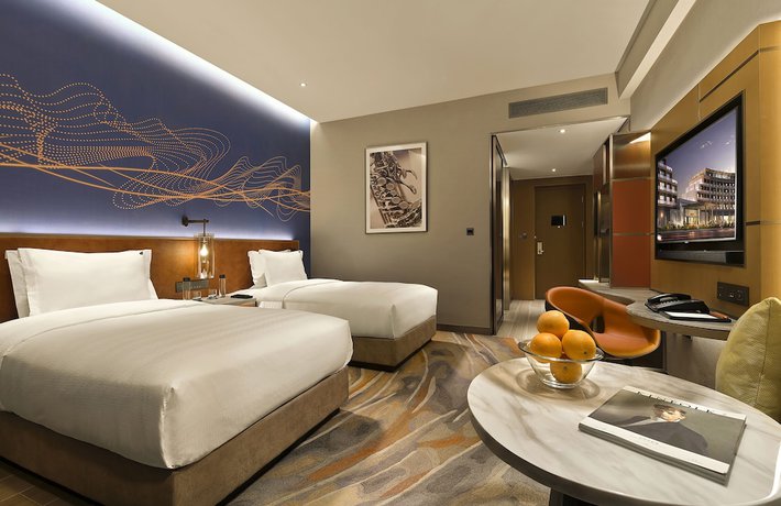 Imagen de la habitación del Hotel Hard Rock Dalian. Foto 17
