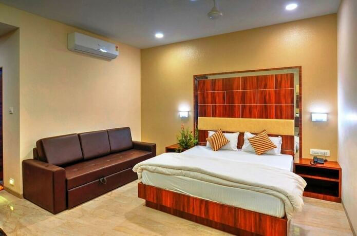 Imagen de la habitación del Hotel Hare Krishna, Navsari. Foto 11