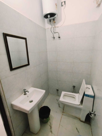 Imagen de la habitación del Hotel Hare Krishna Vrindavan. Foto 11