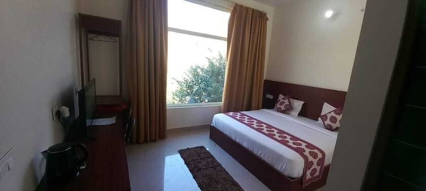 Imagen de la habitación del Hotel Harela Inn. Foto 19
