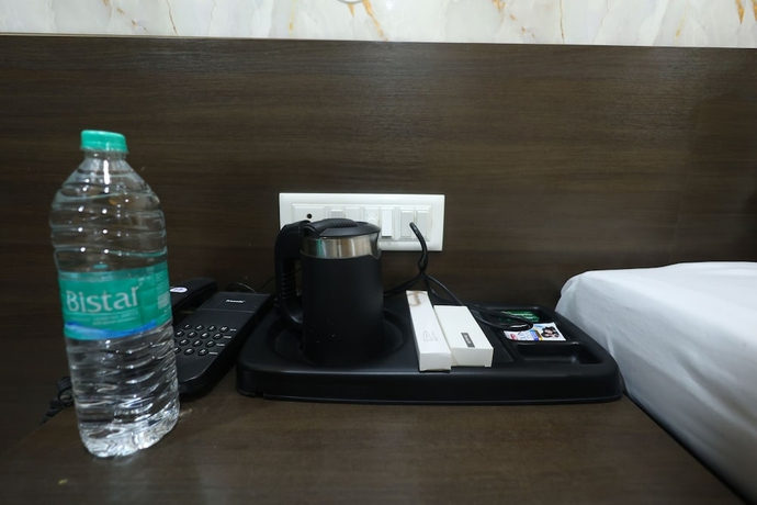 Imagen de la habitación del Hotel Hari Palace, Rajkot. Foto 2