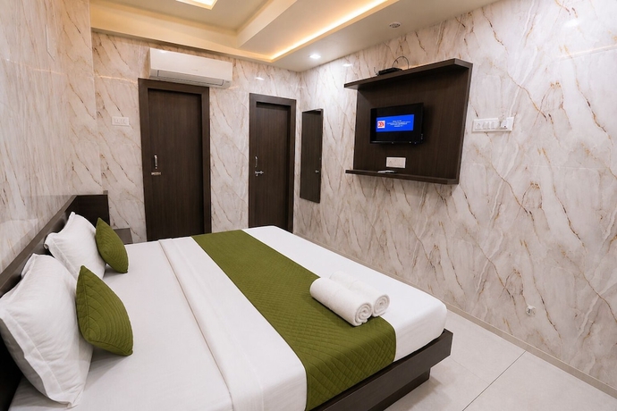 Imagen de la habitación del Hotel Hari Palace, Rajkot. Foto 3