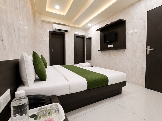 Imagen de la habitación del Hotel Hari Palace, Rajkot. Foto 7