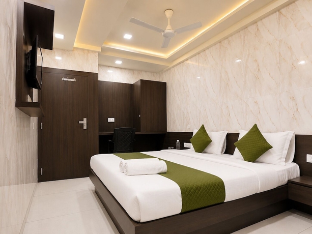 Imagen de la habitación del Hotel Hari Palace, Rajkot. Foto 9