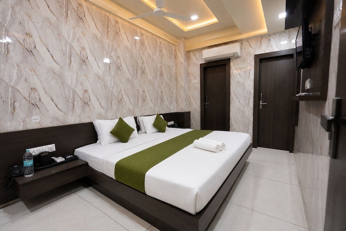 Imagen de la habitación del Hotel Hari Palace, Rajkot. Foto 10
