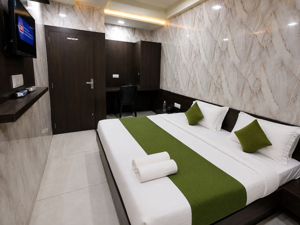Imagen de la habitación del Hotel Hari Palace, Rajkot. Foto 11