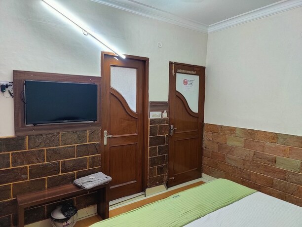 Imagen general del Hotel Harish Guest House -Railway Station Road. Foto 10