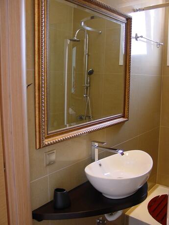 Imagen de la habitación del Hotel Harisis Apartments. Foto 15