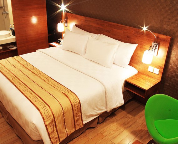 Imagen de la habitación del Hotel Hariston and Suites. Foto 3