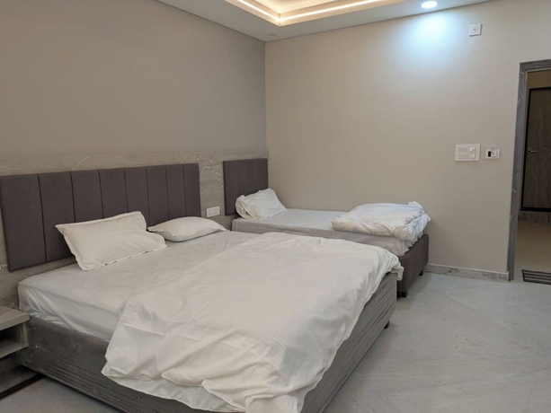 Imagen de la habitación del Hotel Haritwal Guest House. Foto 11