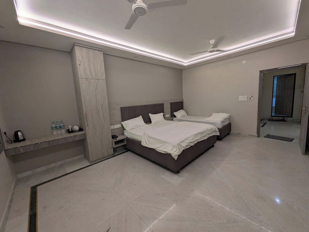 Imagen de la habitación del Hotel Haritwal Guest House. Foto 12