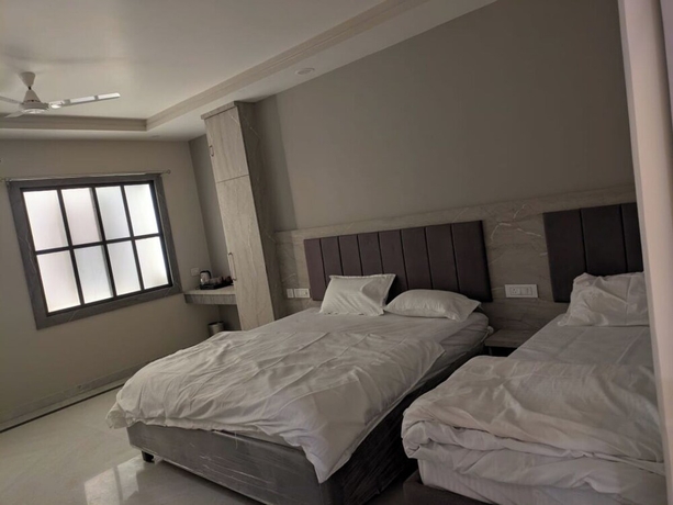 Imagen de la habitación del Hotel Haritwal Guest House. Foto 13