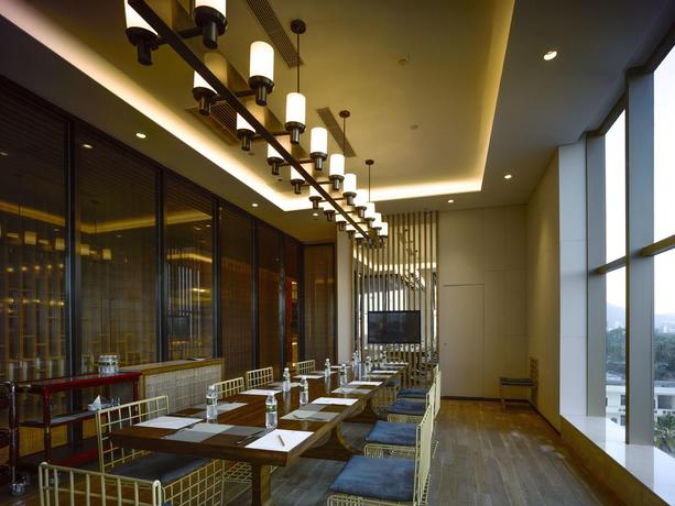 Imagen del bar/restaurante del Hotel Harman Resort Sanya. Foto 8