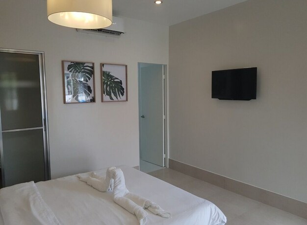 Imagen de la habitación del Hotel Harman Suites Moalboal. Foto 13