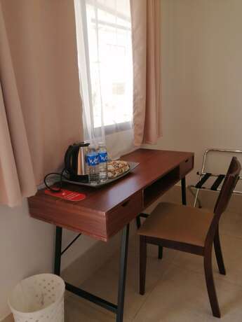Imagen de la habitación del Hotel Harman Suites Moalboal. Foto 16