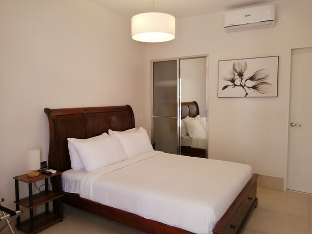 Imagen de la habitación del Hotel Harman Suites Moalboal. Foto 17