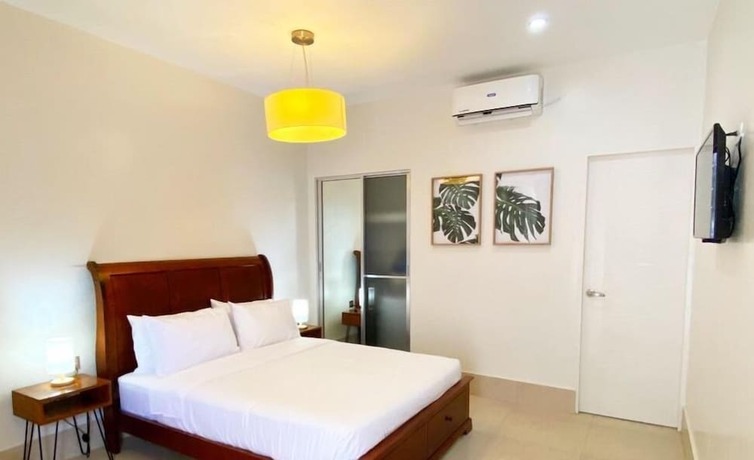 Imagen de la habitación del Hotel Harman Suites Moalboal. Foto 18