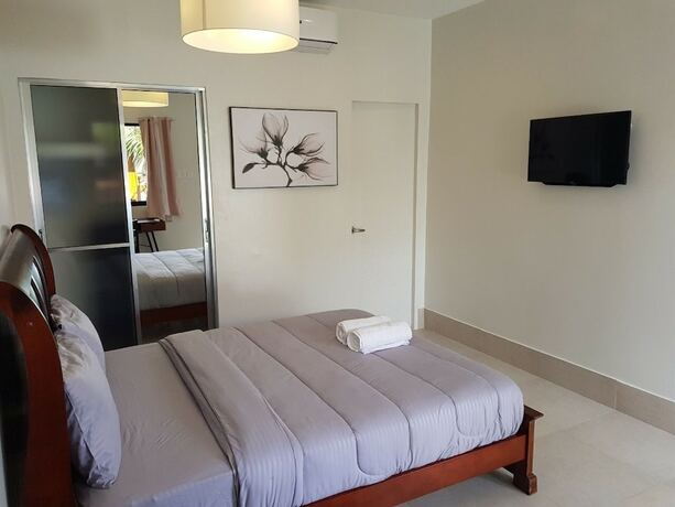 Imagen de la habitación del Hotel Harman Suites Moalboal. Foto 19
