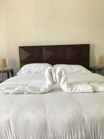 Imagen de la habitación del Hotel Harman Suites Moalboal. Foto 20