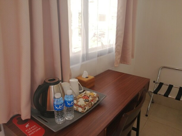 Imagen de la habitación del Hotel Harman Suites Moalboal. Foto 21