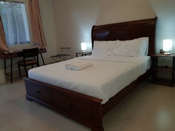 Imagen de la habitación del Hotel Harman Suites Moalboal. Foto 22
