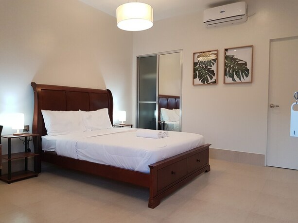 Imagen de la habitación del Hotel Harman Suites Moalboal. Foto 23