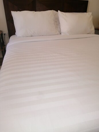 Imagen de la habitación del Hotel Harman Suites Moalboal. Foto 25