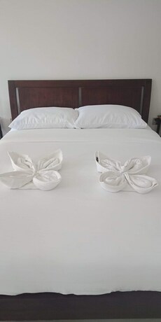 Imagen de la habitación del Hotel Harman Suites Moalboal. Foto 28