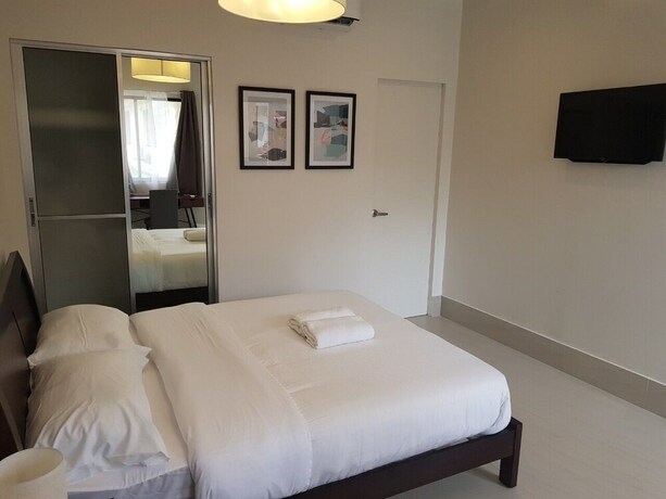 Imagen de la habitación del Hotel Harman Suites Moalboal. Foto 30