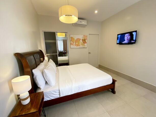 Imagen de la habitación del Hotel Harman Suites Moalboal. Foto 34