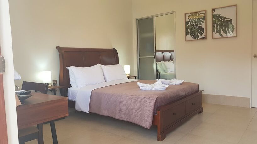 Imagen de la habitación del Hotel Harman Suites Moalboal. Foto 36
